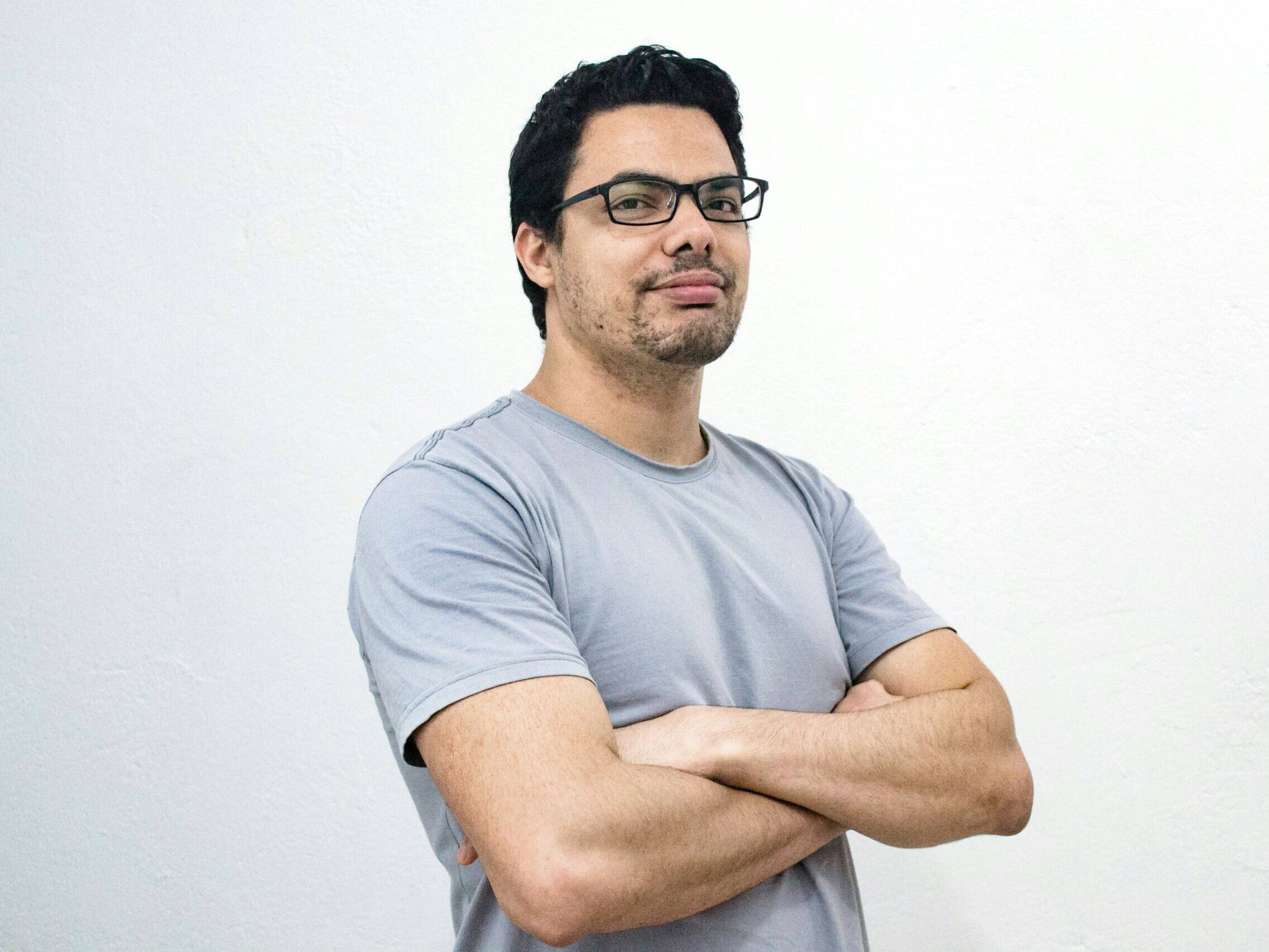 headshot of founder sam t